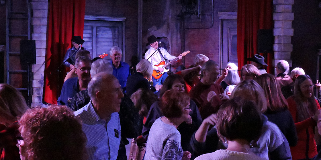 Tim Sullivan playing for a dancing crowd